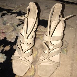 Nude open toe heels.